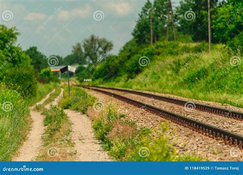 Railway Tracks and a Road Running Parallel Stock Image - Image of ...