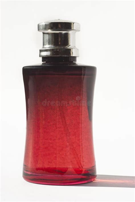 Perfume in red bottle stock photo. Image of beautiful - 25338194