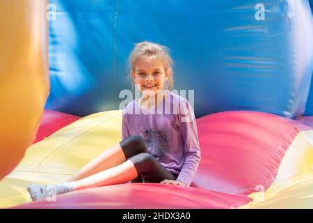 girl, bouncy castle, girls, bouncy castles Stock Photo - Alamy