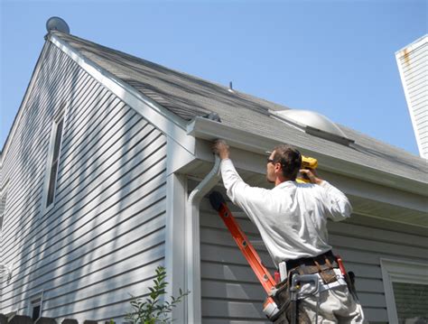 Gutter Installation: Traditional vs. Seamless Gutters - American ...