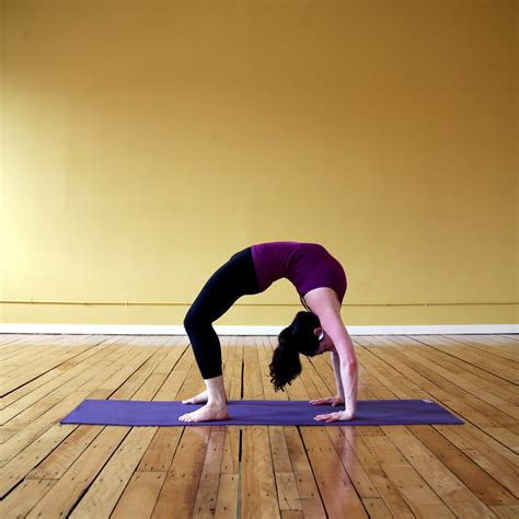 The Yoga Pose Wheel aka Backbend Explained | POPSUGAR Fitness