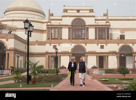 Prime Minister Theresa May and Indian Prime Minister Narendra Modi walk ...