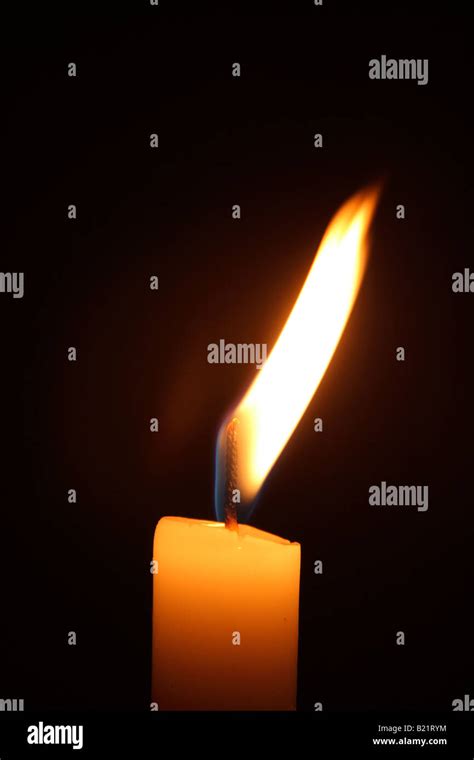 flickering candle flame Stock Photo - Alamy