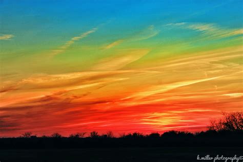 Rainbows At Sunset