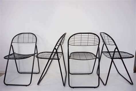 Black Metal Set of Four Folding Chairs at 1stDibs | black metal folding ...