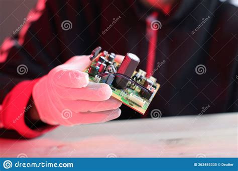 Old Circuit Board with Capacitors and Other Parts in Hands Stock Image ...