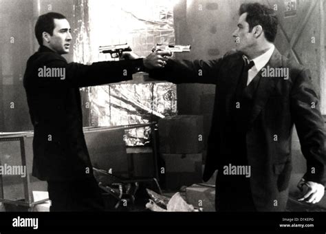 Face off john travolta 1997 sean archer hi-res stock photography and ...