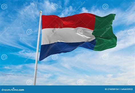 Flag of Dutch Creole Peoples Griqua People at Cloudy Sky Background ...