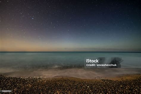 Night Sky With Stars Over The Sea Stock Photo - Download Image Now ...