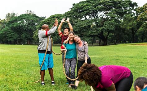 Team competing in tug of war | Premium Photo - rawpixel