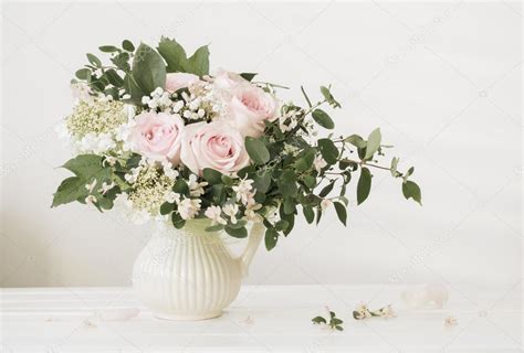 Bouquet of roses on white background Stock Photo by ©Kruchenkova 103847276