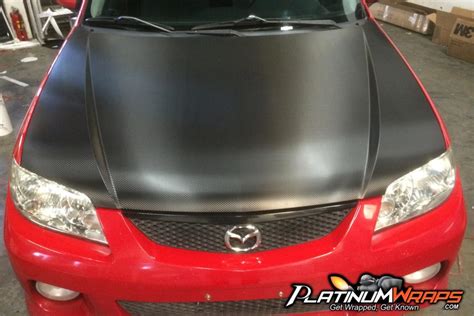 Carbon fiber hood wrap - saloshadow