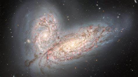 'Cosmic butterfly' wings shimmer in image of colliding galaxies | Space