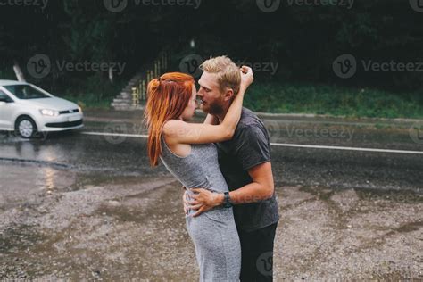 beautiful couple hugging in the rain 11757107 Stock Photo at Vecteezy