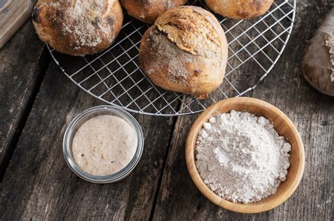 Premium Photo | Starter yeast and homemade sourdough bread