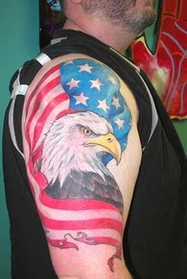 Eagle wrapped in usa flag tattoo on shoulder - Tattooimages.biz