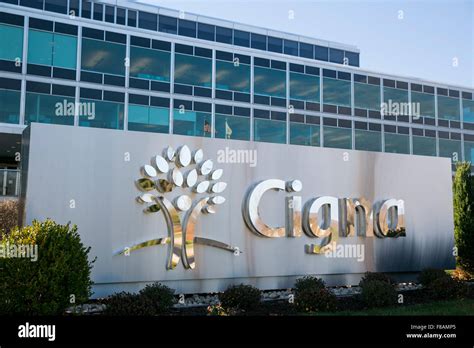 A logo sign outside of the headquarters of health insurer Cigna in ...