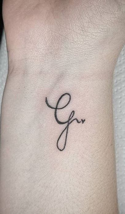 Letter G Tattoo | G tattoo, Letter g tattoo, Cursive tattoos