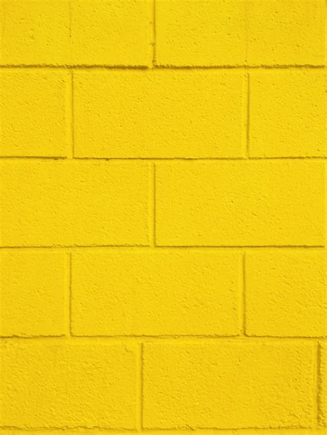 Yellow painted wall with yellow paint photo – Free Yellow Image on Unsplash