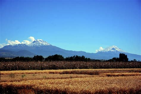 Popocatepetl and Iztaccihuatl Photograph by Phillip Segura