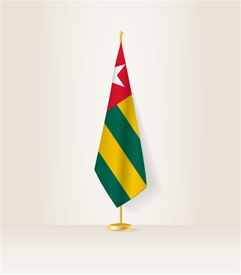 Togo flag on a flag stand. 27290023 Vector Art at Vecteezy