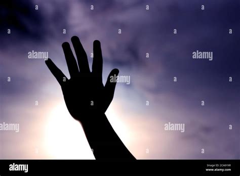 Hand reaching out to the sky Stock Photo - Alamy