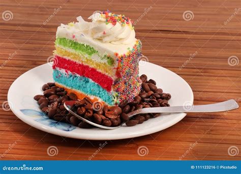 Rainbow cake slice stock photo. Image of beautiful, rainbow - 111123216