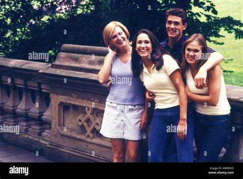 Family smiling, portrait Stock Photo - Alamy