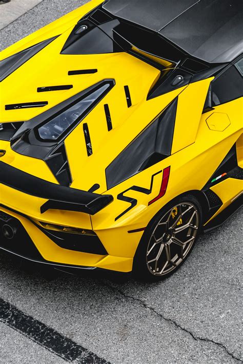 Yellow lamborghini aventador on road photo – Free Tx Image on Unsplash