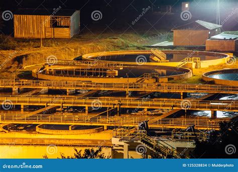 Modern Industrial Wastewater Treatment Plant at Night. Aerial View of ...