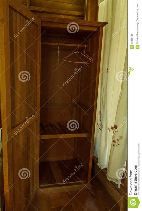 Wooden cupboard stock photo. Image of clothes, nature - 98255186