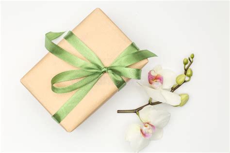 Gift Box with Orchid Flower on White Background Stock Photo - Image of ...