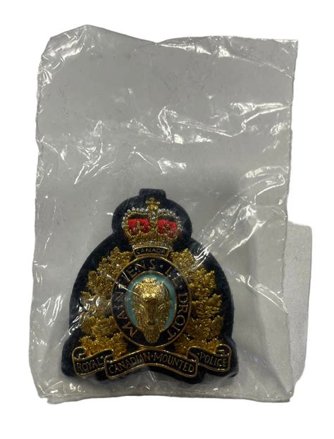 RCMP Officers Cap Badge – Marway Militaria Inc & Winnipeg Army Surplus