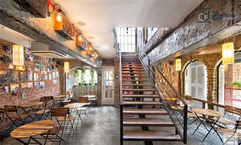 Unconventional Cafe Interior Adding Rustic Flavor To Space | Praveen ...