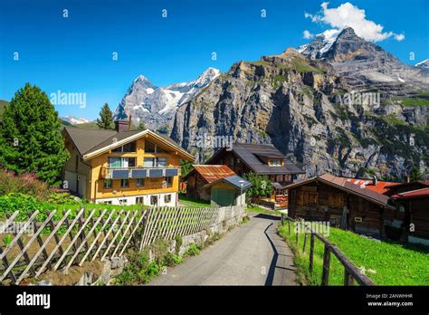 Fantastic mountain resort with traditional alpine wooden houses and ...