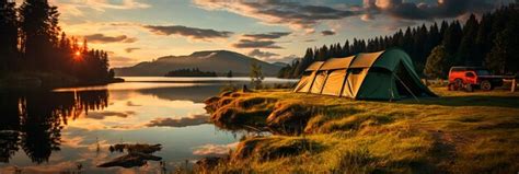 Premium AI Image | camping tent on mountain peak at sunrise travel and ...