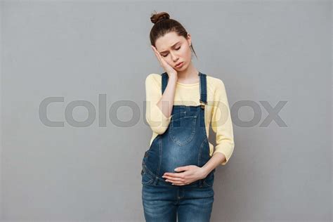 Tired pregnant woman. | Stock image | Colourbox