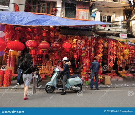 Vietnamese people sell Tet decorations Editorial Stock Image