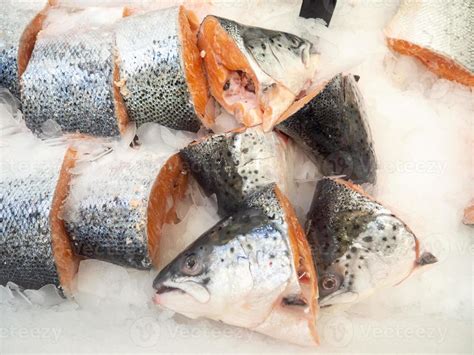 Fish shop. Sale of cut trout. Fish heads. Cooled trout on the counter ...