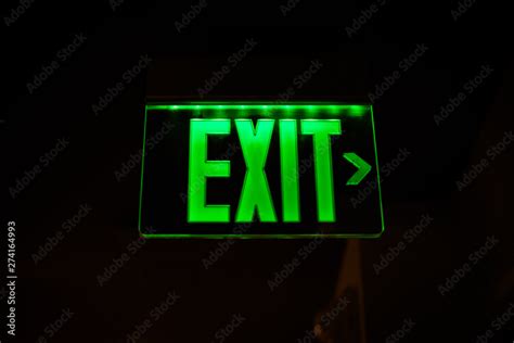 green exit sign neon Stock Photo | Adobe Stock