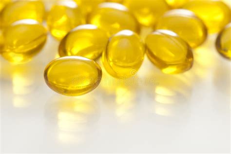 Yellow Gel Capsule Pill Royalty Free Stock Photo - Image: 15178165