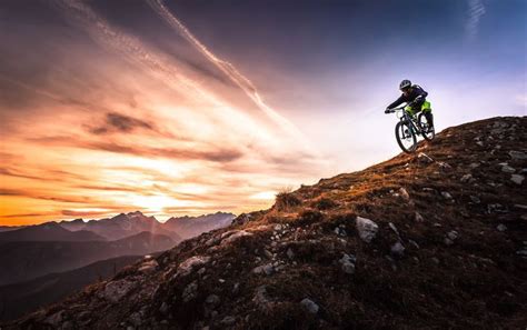 Sunset Mountain Bike Photography. Riding mountain bikes down hills ...