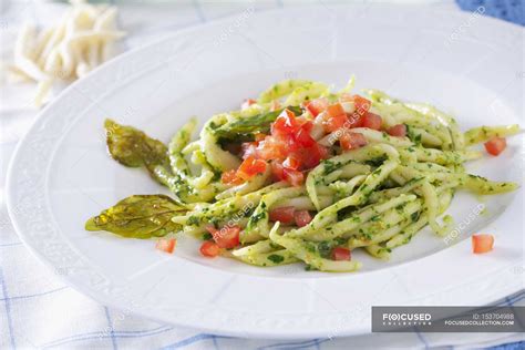 Trofie pasta with pesto — dish, plate - Stock Photo | #153704988