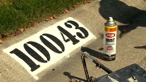 House numbers on the curb made with reflective paint could help in ...