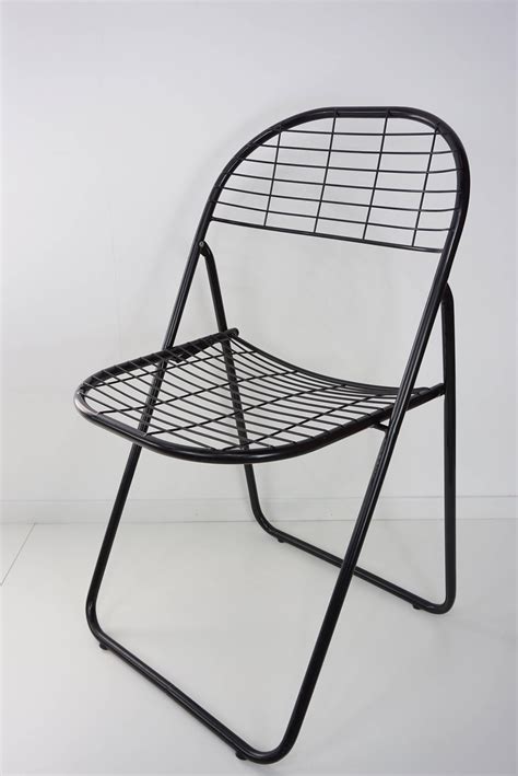 Black Metal Set of Four Folding Chairs at 1stDibs | black metal folding ...