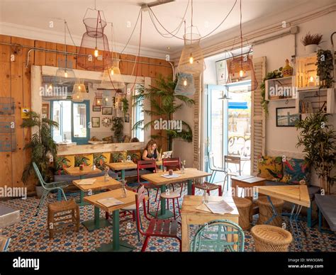 Interior of small independent cafe in the Malasana district, Madrid ...