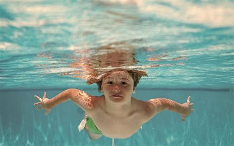 Underwater Child in the Swimming Pool. Cute Kid Boy Swimming in Pool ...