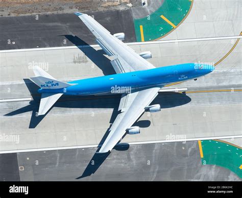 Aerial view of Royal Dutch Airlines Boeing 747 departure from LAX ...