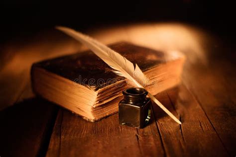 Quill Pen And Inkwell On Old Book Stock Image - Image of desk, ancient ...