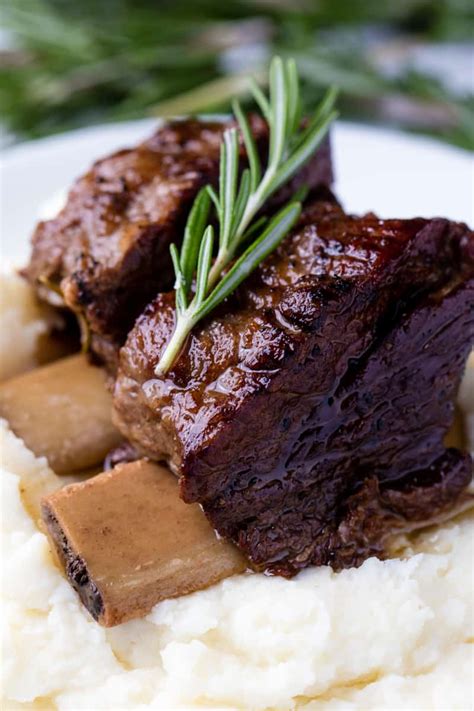 Slow Cooker Beef Short Ribs are cooked in the crockpot until they reach ...